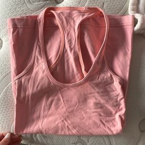Lululemon, size 2, racer back workout top in light coral